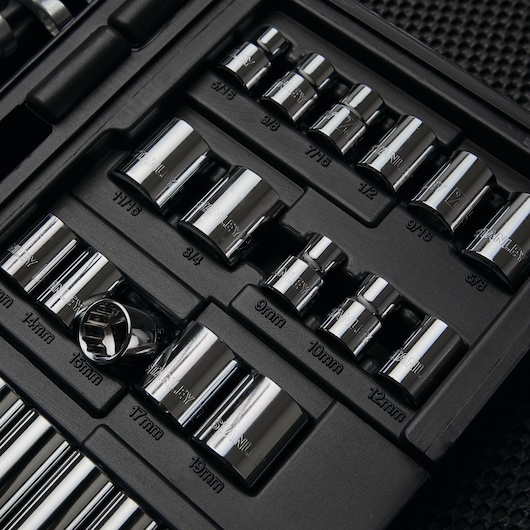 STANLEY 97-543 chrome socket set in black plastic case, various metric and SAE sizes visible, top view.