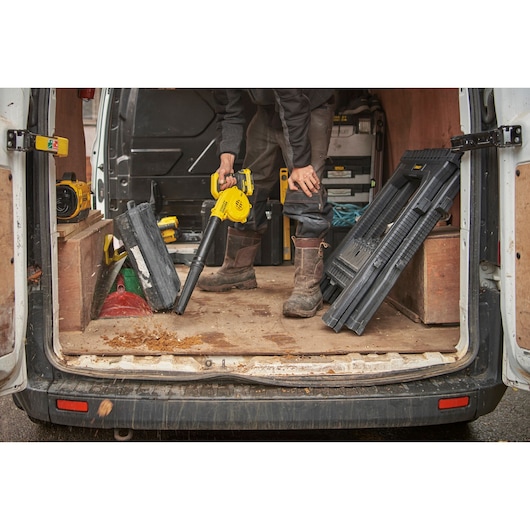 STANLEY SCBL01 blower cleaning van interior with tools and debris visible, front angle photography.