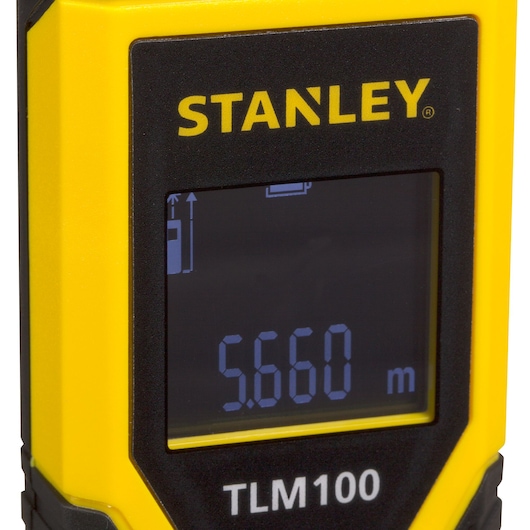 STANLEY STHT77410 laser distance measurer close-up showing digital display reading 5.660 meters.