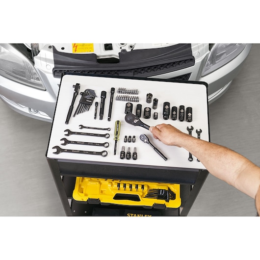 Application shot of STANLEY Black Chrome Mechanics Tool Set in car workshop